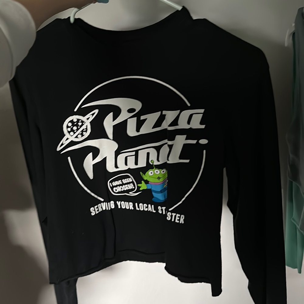Black pizza planet long sleeve with alien design on front and back.
